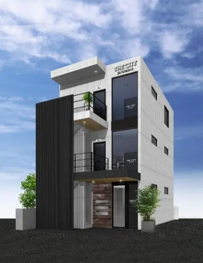 - モダンな外観の三階建てビル、黒い縦格子のファサードと大きな窓、緑の植栽が調和したデザイン