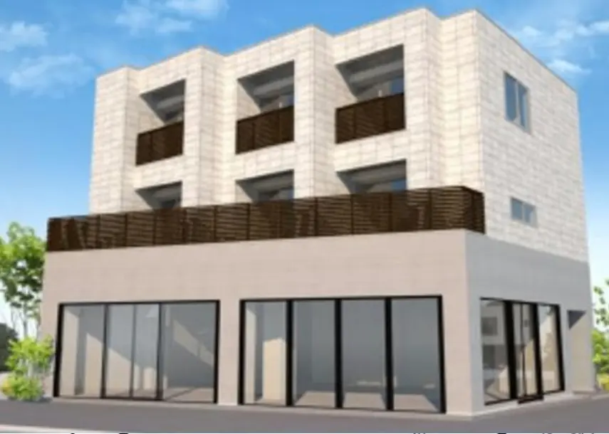 - モダンな外観の建物、3階建てで大きな窓とバルコニーを備えたデザイン、青空を背景にしたシンプルなスタイル