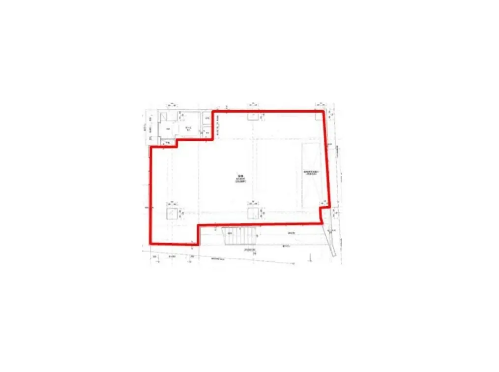 建築プランの図面、赤い線で示された区域と部屋の配置