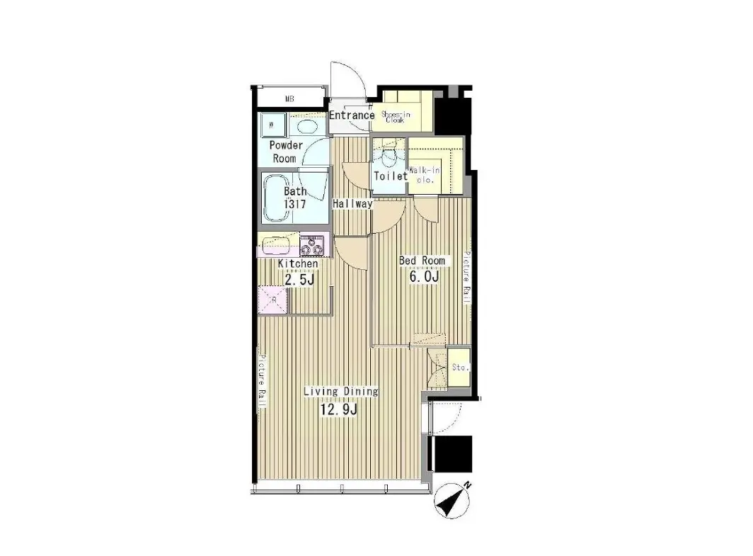 - 1LDKの間取り図、リビングダイニング12.9畳、寝室6.0畳、キッチン2.5畳、バスルームとトイレが配置されたファミリー向け設計