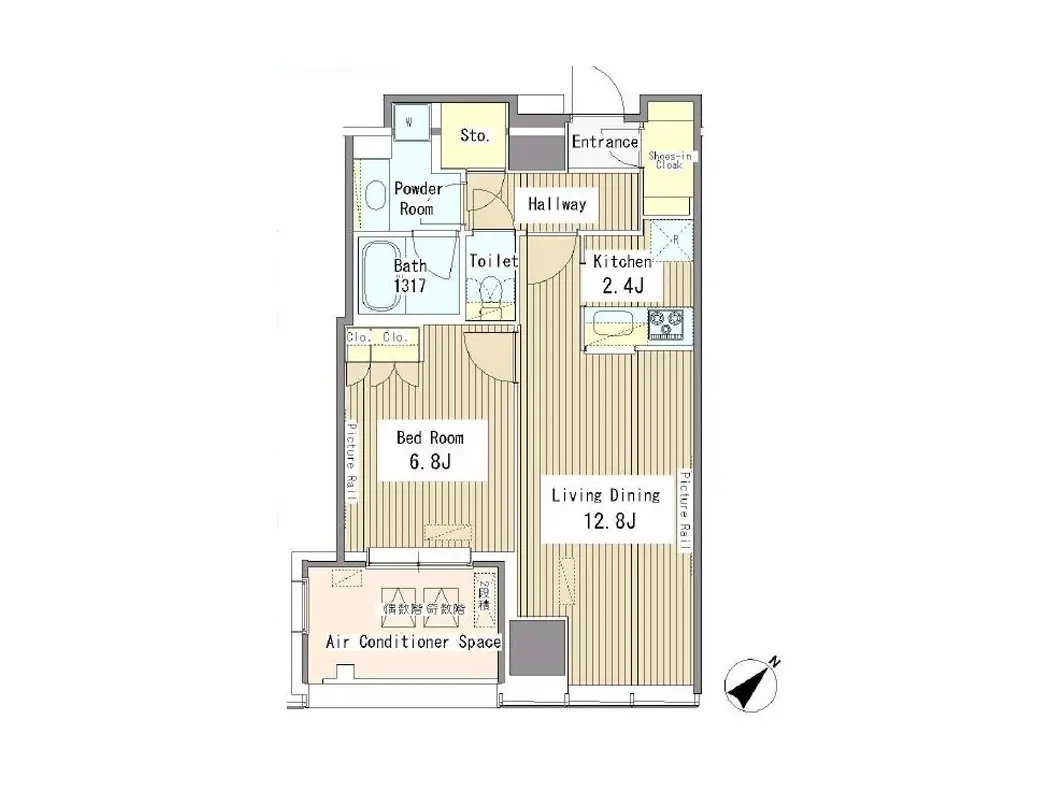 - 間取り図、リビングダイニング、キッチン、寝室、バスルーム、トイレを含む住宅の配置を示す。