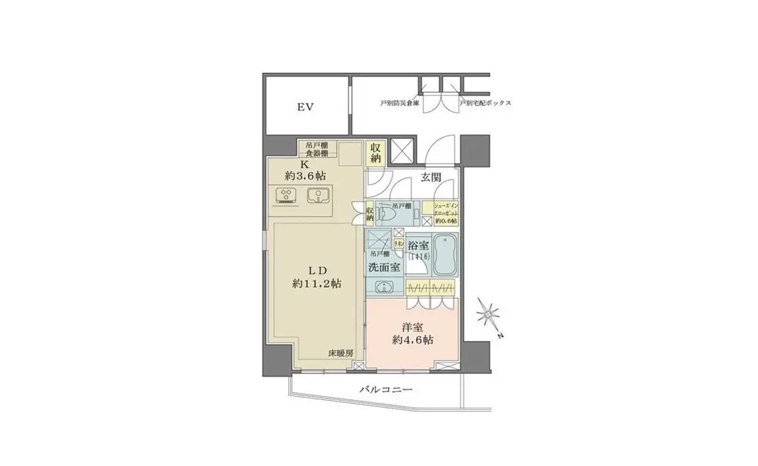 - 住宅の間取り図、リビングダイニング約11.2畳、キッチン約3.6畳、洋室約4.6畳、洗面室と浴室を含むレイアウト